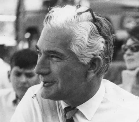 A portrait of Jens Risom with a cigarette in mouth